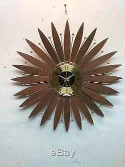 MCM Seth Thomas Intrigue Sunflower Starburst Walnut/Brass Clock. New Movement