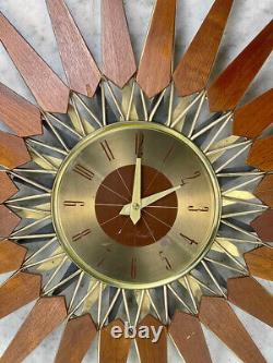 Mid-Century Modern Atomic Walnut Sunburst Sculpted Wall Hanging Clock