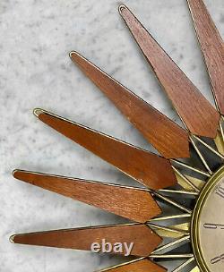 Mid-Century Modern Atomic Walnut Sunburst Sculpted Wall Hanging Clock