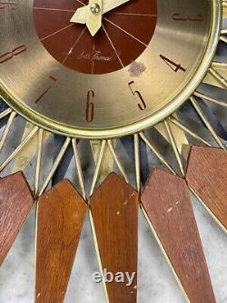 Mid-Century Modern Atomic Walnut Sunburst Sculpted Wall Hanging Clock