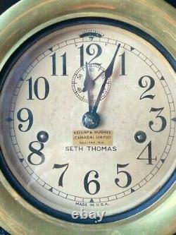 Vintage Seth Thomas Ship's Bell Clock working and has both original keys