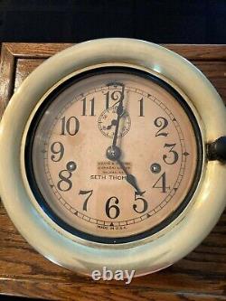 Vintage Seth Thomas Ship's Bell Clock working and has both original keys